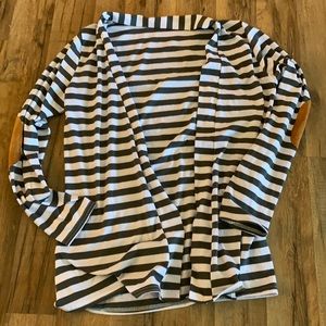 Grey and white sweater.